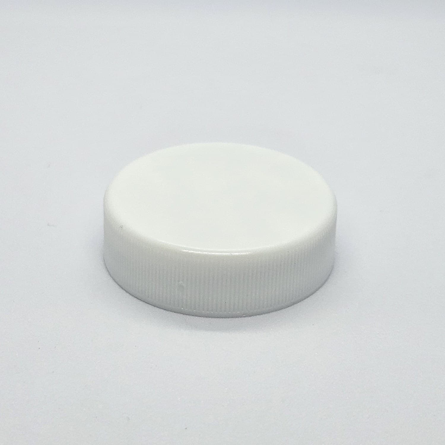 Tapa plana R-38 blanca · sello de inducción